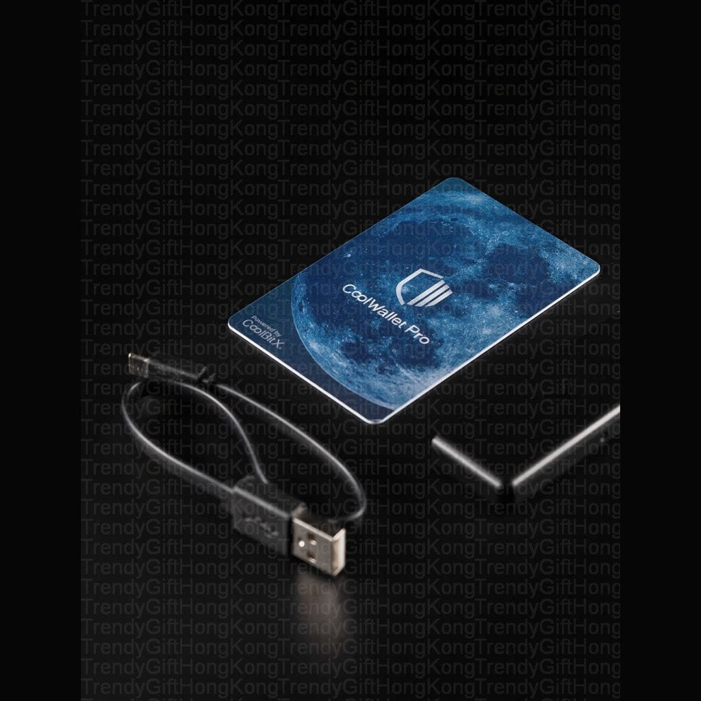 CoolWallet Pro — card-shaped hardware wallet beside a USB cable and a small black adapter