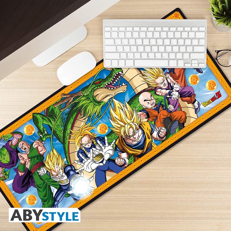 Dragon Ball Z character mousepad shown on a desk beneath a keyboard and beside a mouse.