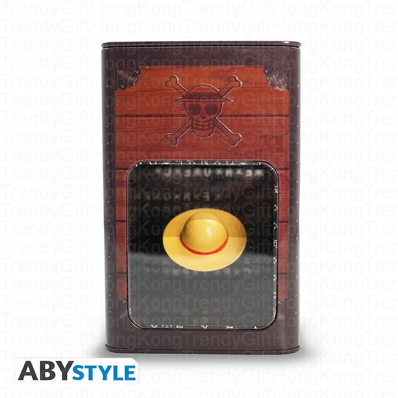 ABYstyle One Piece metal Strawhat money bank, 16.6 cm tall, with suspended hat coin cover.