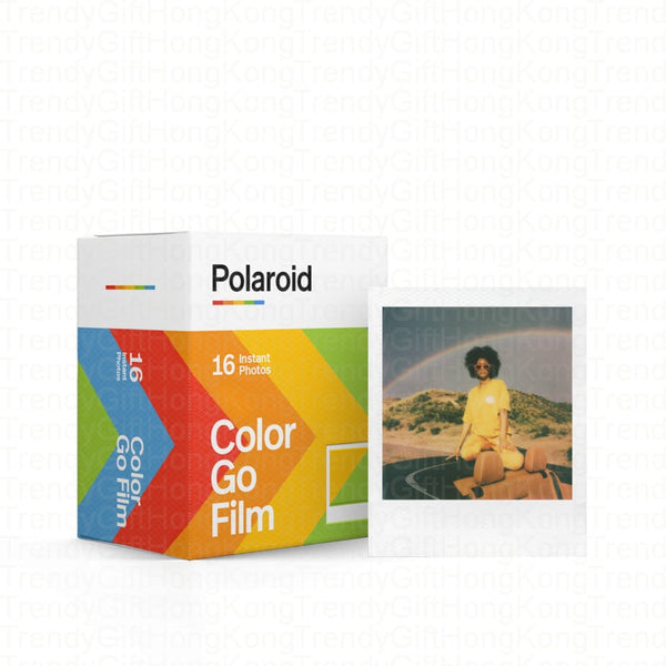 Color Go Film box beside a white-bordered portrait print of a seated person.