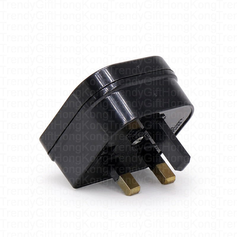 Angled view of the converter adapter with UK plug pins