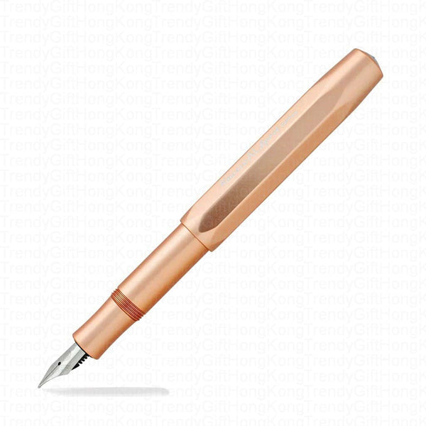 Close angled view of the rose gold Kaweco AL Sport pen with its nib facing forward.