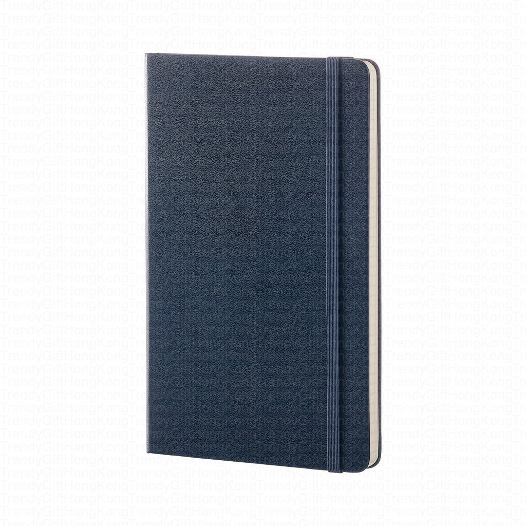 Front cover of a navy Moleskine Classic notebook with elastic band