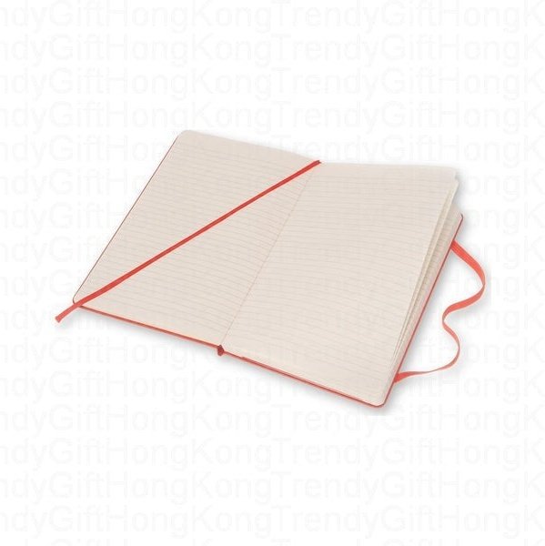 Open red Moleskine notebook with ruled pages and red elastic closure