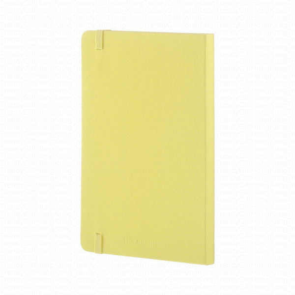 Yellow Moleskine hard cover shown from the back