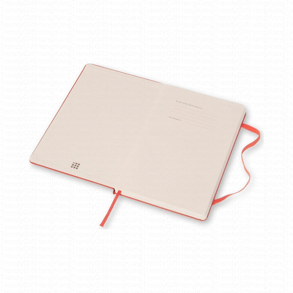Pale underside of the red Moleskine notebook with ribbon marker