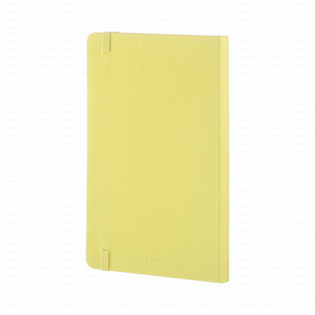 Yellow Moleskine notebook back cover with elastic closure
