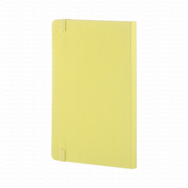 Yellow Moleskine notebook back cover with elastic closure