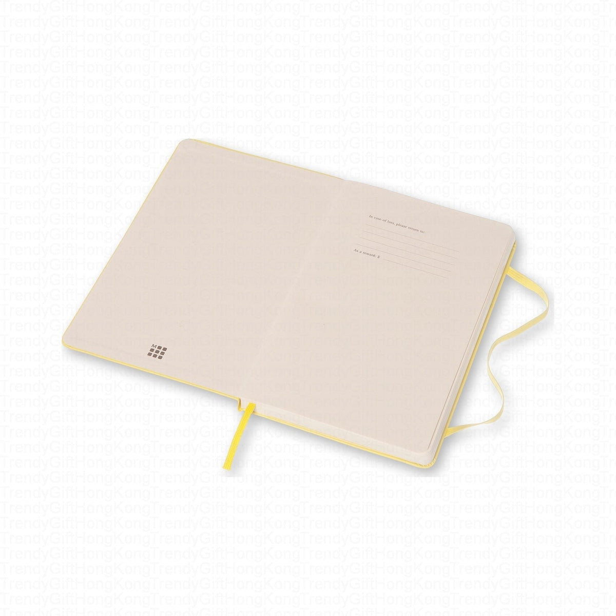 Pale underside of the yellow Moleskine notebook with yellow ribbon