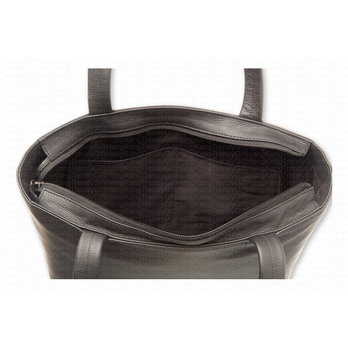 Top view into the black tote bag showing the lined interior and compartments