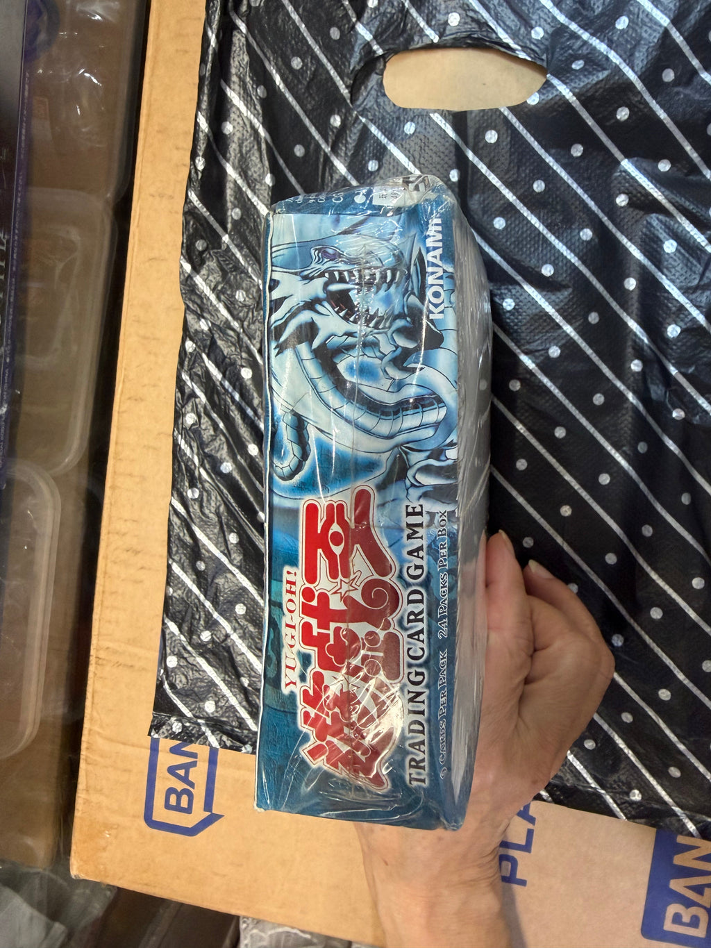 Opposite side panel of the actual Asian English 1st Edition Yu-Gi-Oh! box.