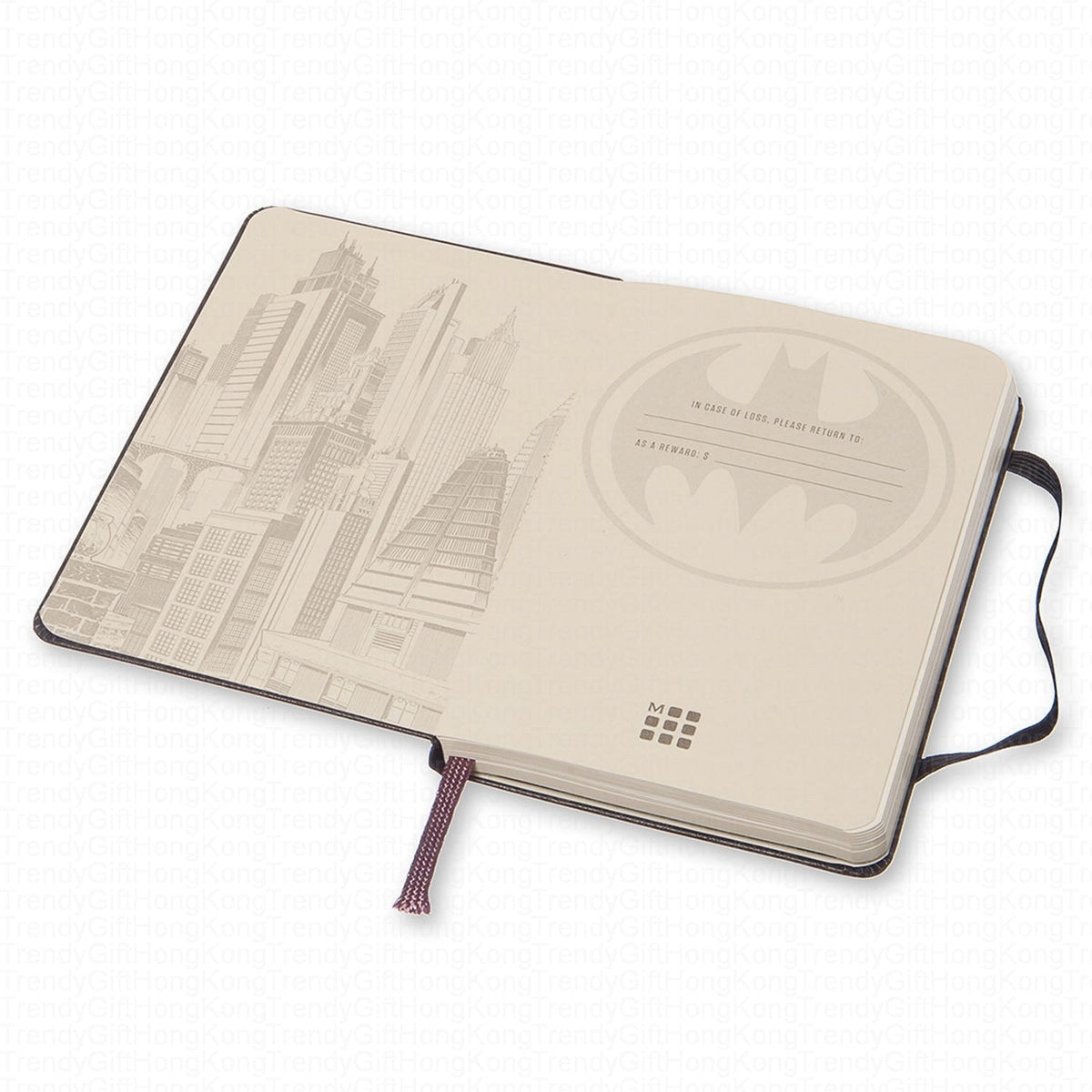 Open Batman notebook showing the Gotham City endpaper illustration
